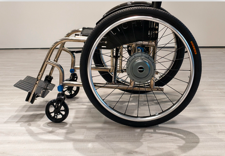 Moveble Hub Wheel Onward Mobility Hub Motor Wheel Set on a wheelchair, showcasing the hub ...